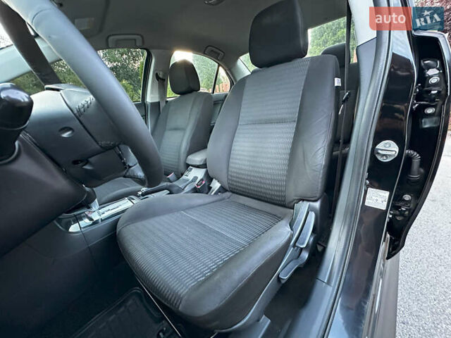 Чорний Міцубісі Lancer, об'ємом двигуна 1.59 л та пробігом 146 тис. км за 8950 $, фото 24 на Automoto.ua