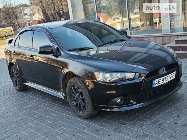 Чорний Міцубісі Lancer, об'ємом двигуна 1.59 л та пробігом 185 тис. км за 8499 $, фото 1 на Automoto.ua