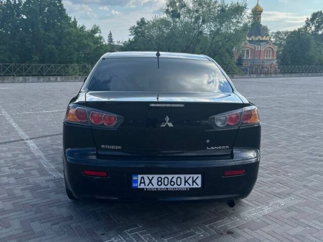 Чорний Міцубісі Lancer, об'ємом двигуна 1.6 л та пробігом 201 тис. км за 7650 $, фото 3 на Automoto.ua