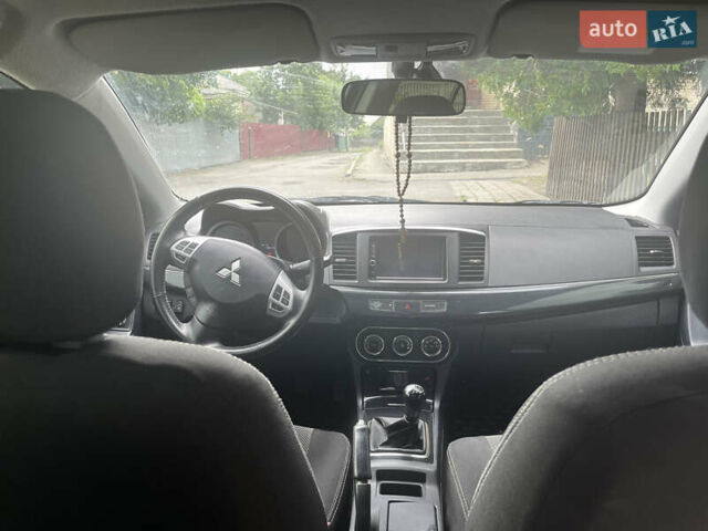 Черный Мицубиси Лансер, объемом двигателя 1.8 л и пробегом 224 тыс. км за 7300 $, фото 8 на Automoto.ua
