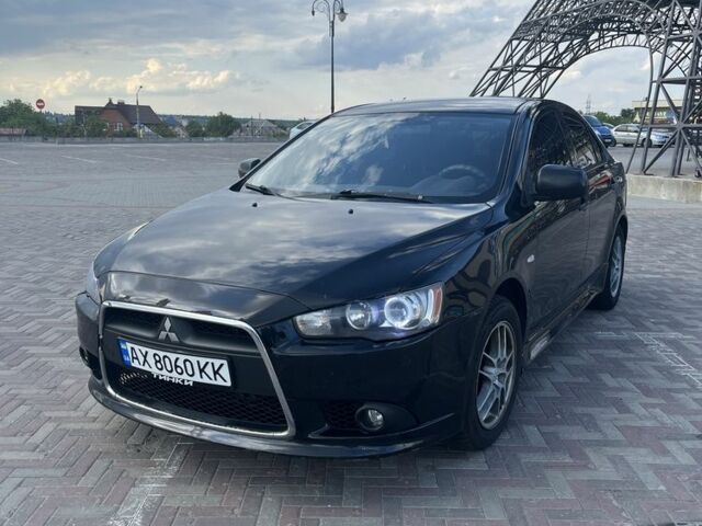 Чорний Міцубісі Lancer, об'ємом двигуна 1.6 л та пробігом 200 тис. км за 7500 $, фото 2 на Automoto.ua