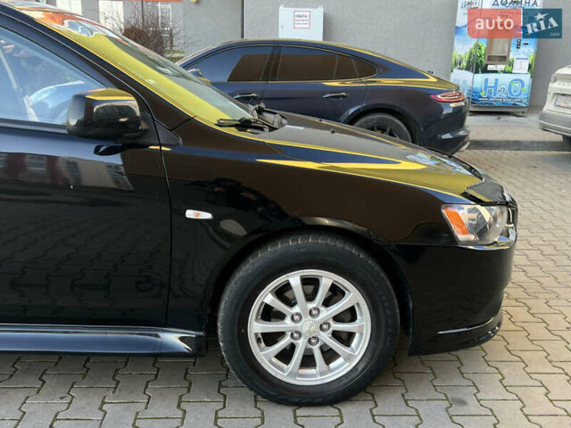 Черный Мицубиси Лансер, объемом двигателя 1.59 л и пробегом 186 тыс. км за 7300 $, фото 9 на Automoto.ua