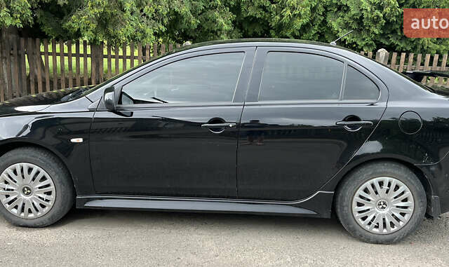 Черный Мицубиси Лансер, объемом двигателя 1.8 л и пробегом 224 тыс. км за 7300 $, фото 6 на Automoto.ua