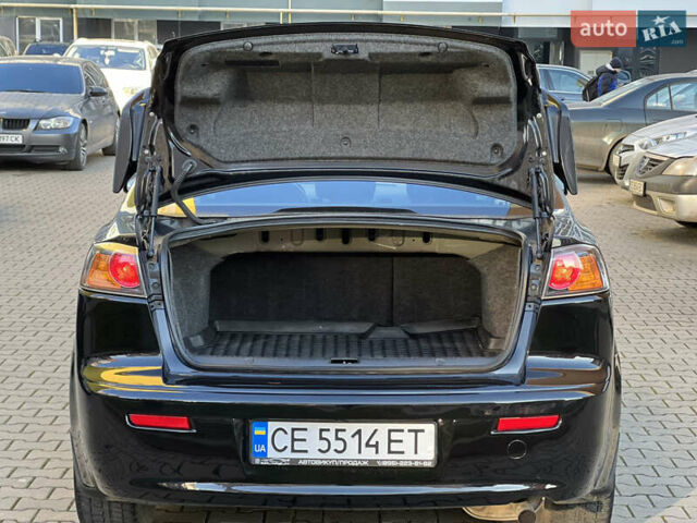 Черный Мицубиси Лансер, объемом двигателя 1.59 л и пробегом 186 тыс. км за 7300 $, фото 7 на Automoto.ua