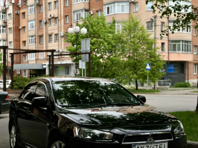 Чорний Міцубісі Lancer, об'ємом двигуна 2 л та пробігом 93 тис. км за 8800 $, фото 1 на Automoto.ua