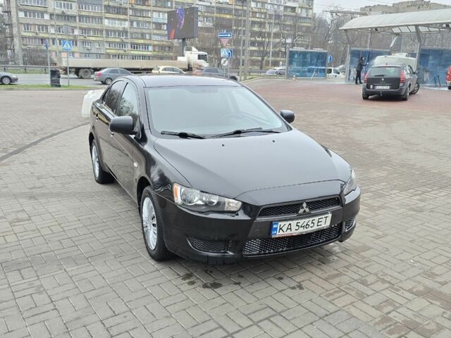 Черный Мицубиси Лансер, объемом двигателя 2 л и пробегом 223 тыс. км за 5500 $, фото 7 на Automoto.ua