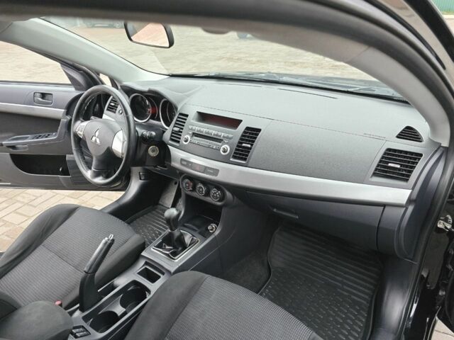 Черный Мицубиси Лансер, объемом двигателя 2 л и пробегом 223 тыс. км за 5500 $, фото 10 на Automoto.ua