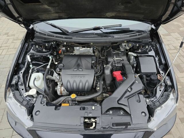 Черный Мицубиси Лансер, объемом двигателя 2 л и пробегом 223 тыс. км за 5500 $, фото 18 на Automoto.ua