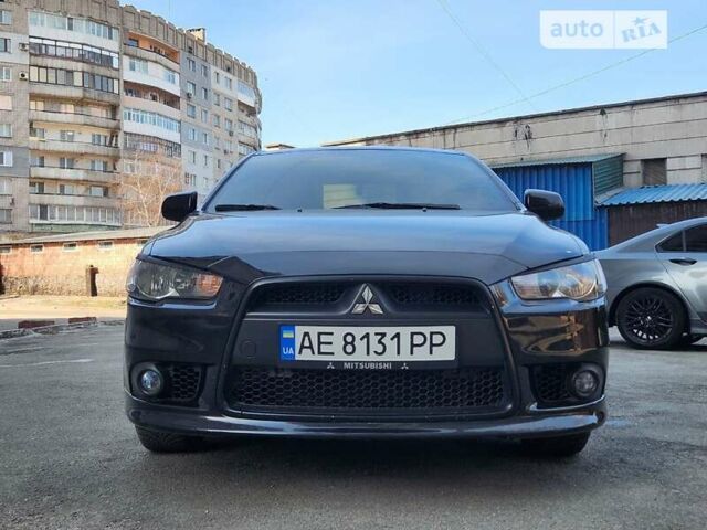 Чорний Міцубісі Lancer, об'ємом двигуна 1.59 л та пробігом 185 тис. км за 8499 $, фото 9 на Automoto.ua