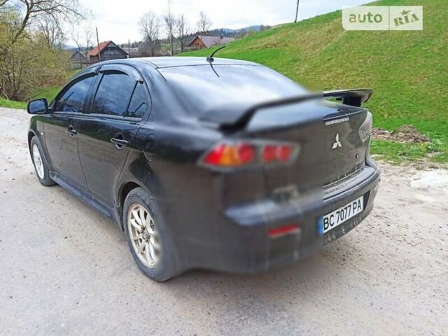 Чорний Міцубісі Lancer, об'ємом двигуна 1.6 л та пробігом 105 тис. км за 8800 $, фото 6 на Automoto.ua