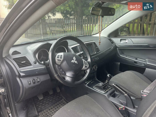 Черный Мицубиси Лансер, объемом двигателя 1.8 л и пробегом 224 тыс. км за 7300 $, фото 7 на Automoto.ua