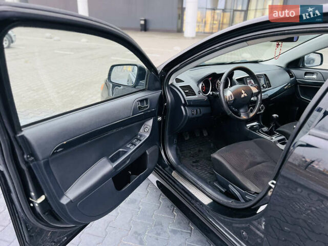 Черный Мицубиси Лансер, объемом двигателя 1.6 л и пробегом 216 тыс. км за 7200 $, фото 16 на Automoto.ua