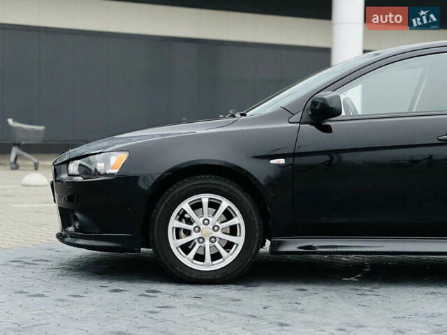 Черный Мицубиси Лансер, объемом двигателя 1.6 л и пробегом 216 тыс. км за 7200 $, фото 12 на Automoto.ua