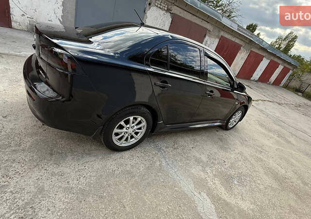 Міцубісі Lancer 2013 у Дніпро (Дніпропетровську) на Automoto.ua Чорний Міцубісі Lancer, об'ємом двигуна 1.6 л та пробігом 178 тис. км за 7500 $, фото 17 на Automoto.ua