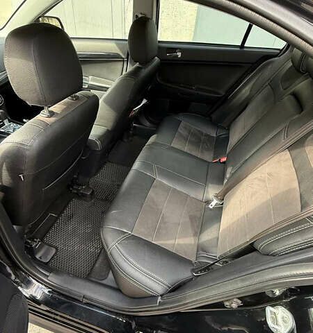 Міцубісі Lancer 2013 у Дніпро (Дніпропетровську) на Automoto.ua Чорний Міцубісі Lancer, об'ємом двигуна 1.6 л та пробігом 178 тис. км за 7500 $, фото 6 на Automoto.ua
