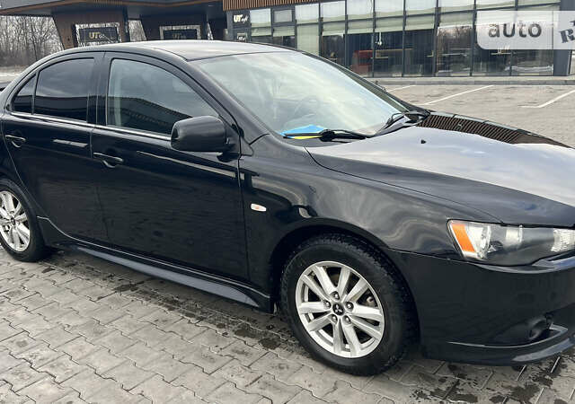 Чорний Міцубісі Lancer, об'ємом двигуна 1.8 л та пробігом 264 тис. км за 7700 $, фото 2 на Automoto.ua