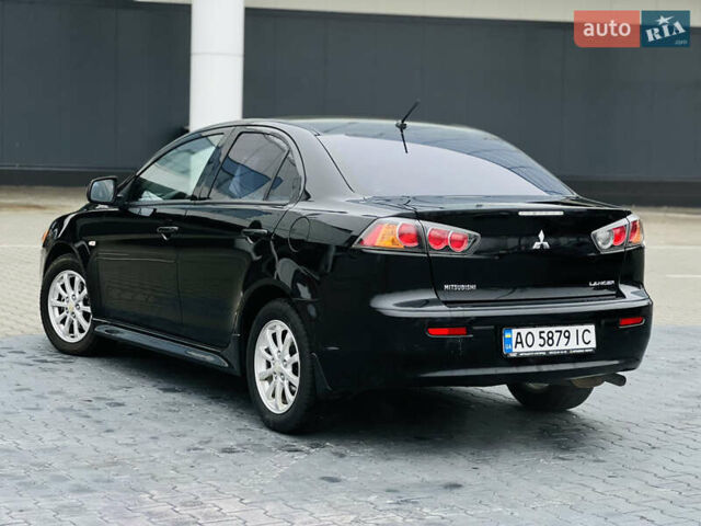 Черный Мицубиси Лансер, объемом двигателя 1.6 л и пробегом 216 тыс. км за 7200 $, фото 10 на Automoto.ua