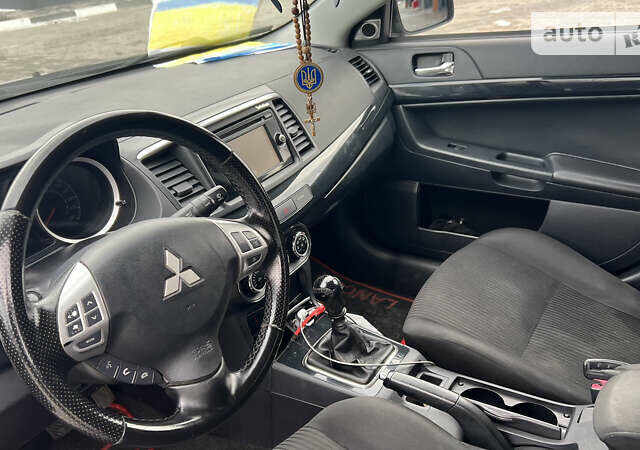 Чорний Міцубісі Lancer, об'ємом двигуна 1.8 л та пробігом 264 тис. км за 7700 $, фото 5 на Automoto.ua