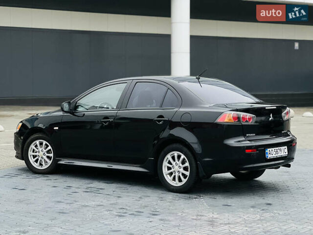 Черный Мицубиси Лансер, объемом двигателя 1.6 л и пробегом 216 тыс. км за 7200 $, фото 9 на Automoto.ua