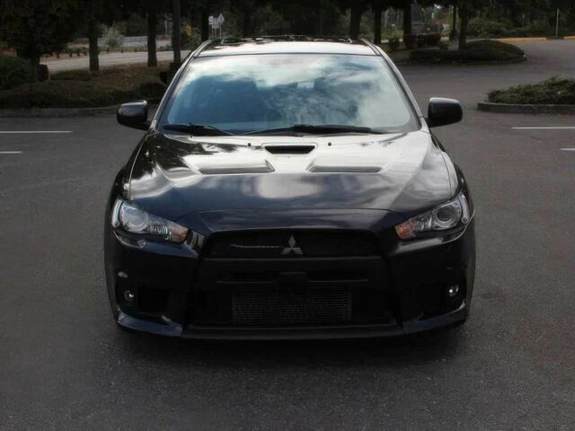 Чорний Міцубісі Lancer, об'ємом двигуна 2 л та пробігом 85 тис. км за 6500 $, фото 1 на Automoto.ua