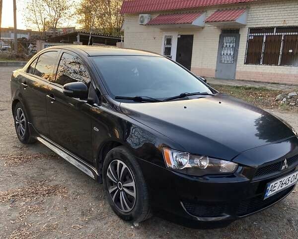 Черный Мицубиси Лансер, объемом двигателя 2 л и пробегом 175 тыс. км за 9200 $, фото 14 на Automoto.ua