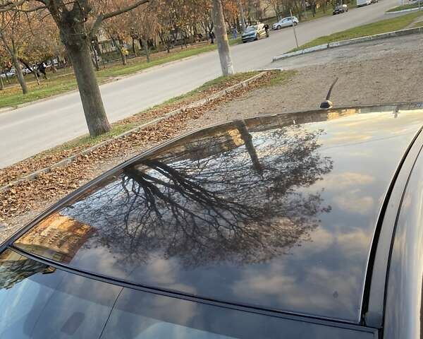 Черный Мицубиси Лансер, объемом двигателя 2 л и пробегом 175 тыс. км за 9200 $, фото 15 на Automoto.ua