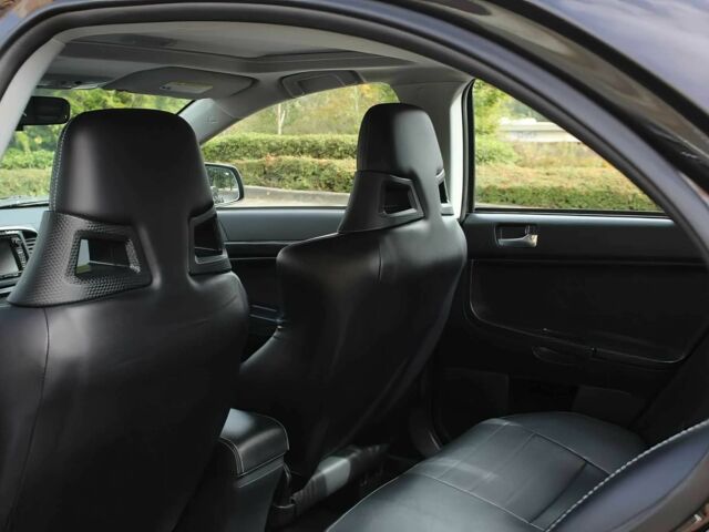 Чорний Міцубісі Lancer, об'ємом двигуна 2 л та пробігом 85 тис. км за 6500 $, фото 12 на Automoto.ua