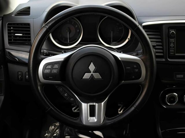 Чорний Міцубісі Lancer, об'ємом двигуна 2 л та пробігом 82 тис. км за 11000 $, фото 9 на Automoto.ua