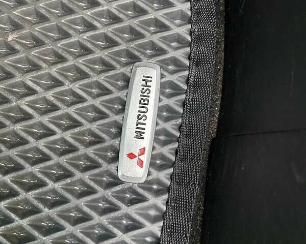 Черный Мицубиси Лансер, объемом двигателя 2 л и пробегом 175 тыс. км за 9200 $, фото 11 на Automoto.ua