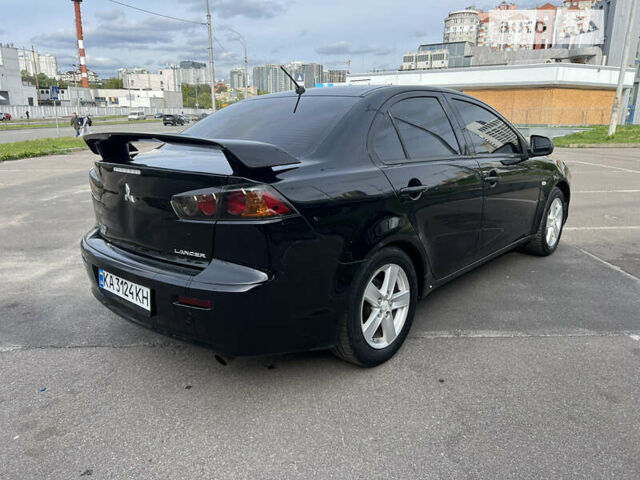 Чорний Міцубісі Lancer, об'ємом двигуна 2 л та пробігом 183 тис. км за 6500 $, фото 5 на Automoto.ua