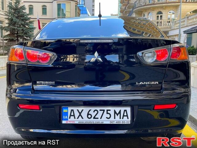 Чорний Міцубісі Lancer, об'ємом двигуна 1.6 л та пробігом 131 тис. км за 8500 $, фото 5 на Automoto.ua