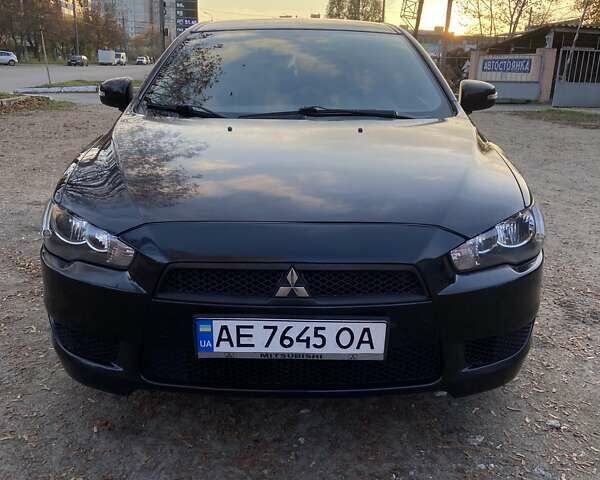Черный Мицубиси Лансер, объемом двигателя 2 л и пробегом 175 тыс. км за 9200 $, фото 13 на Automoto.ua