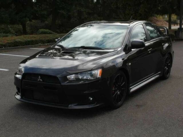 Чорний Міцубісі Lancer, об'ємом двигуна 2 л та пробігом 85 тис. км за 6500 $, фото 2 на Automoto.ua
