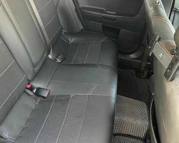 Черный Мицубиси Лансер, объемом двигателя 2 л и пробегом 175 тыс. км за 9200 $, фото 6 на Automoto.ua