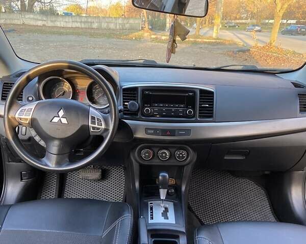 Черный Мицубиси Лансер, объемом двигателя 2 л и пробегом 175 тыс. км за 9200 $, фото 10 на Automoto.ua