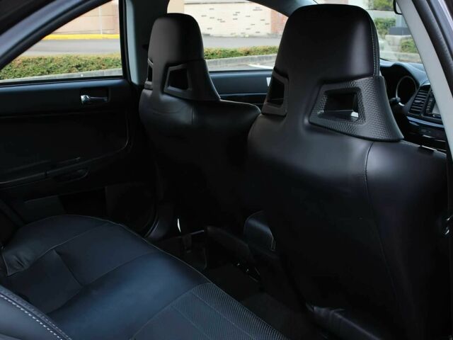 Чорний Міцубісі Lancer, об'ємом двигуна 2 л та пробігом 85 тис. км за 6500 $, фото 11 на Automoto.ua