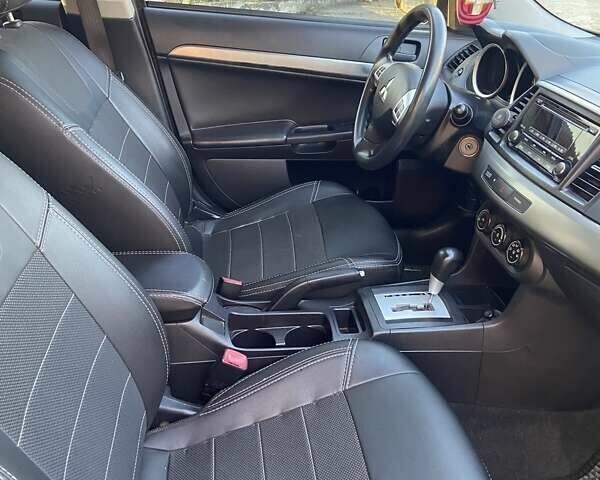 Черный Мицубиси Лансер, объемом двигателя 2 л и пробегом 175 тыс. км за 9200 $, фото 9 на Automoto.ua