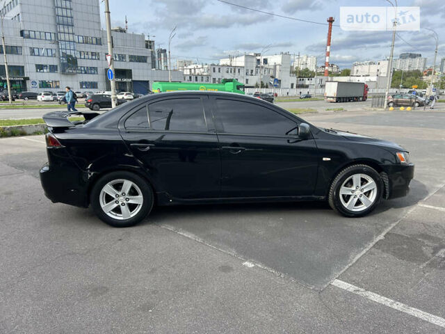 Чорний Міцубісі Lancer, об'ємом двигуна 2 л та пробігом 183 тис. км за 6500 $, фото 6 на Automoto.ua