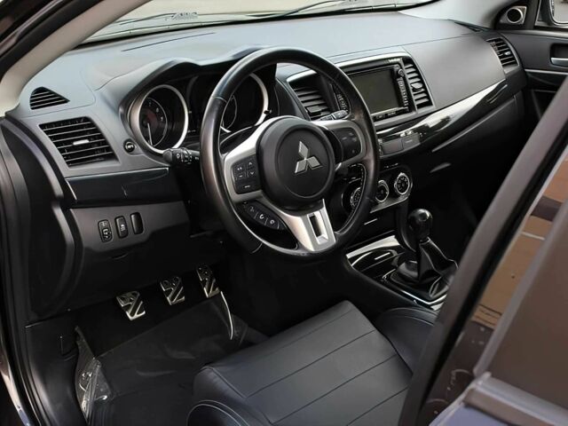 Чорний Міцубісі Lancer, об'ємом двигуна 2 л та пробігом 82 тис. км за 11000 $, фото 8 на Automoto.ua