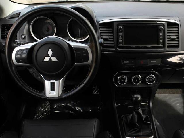 Чорний Міцубісі Lancer, об'ємом двигуна 2 л та пробігом 85 тис. км за 6500 $, фото 10 на Automoto.ua
