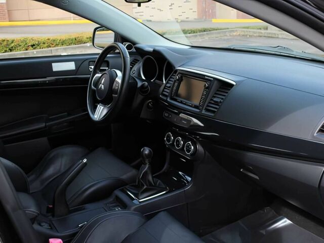 Чорний Міцубісі Lancer, об'ємом двигуна 2 л та пробігом 82 тис. км за 11000 $, фото 10 на Automoto.ua
