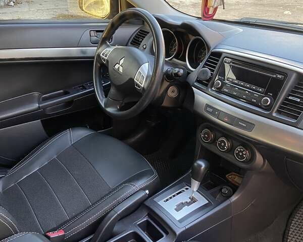 Черный Мицубиси Лансер, объемом двигателя 2 л и пробегом 175 тыс. км за 9200 $, фото 3 на Automoto.ua