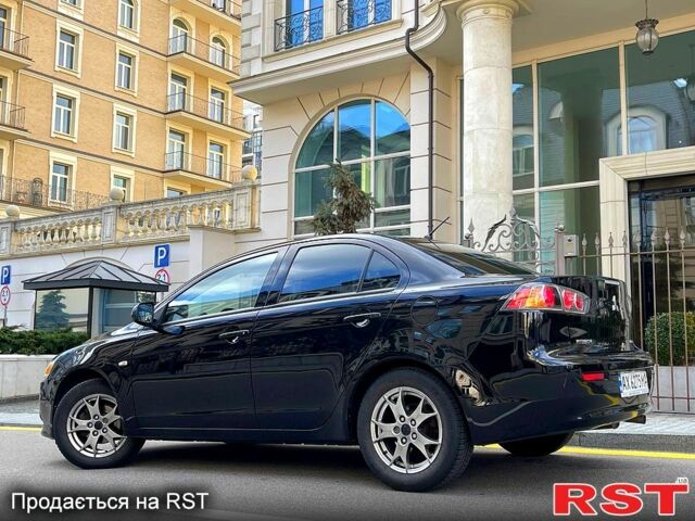 Чорний Міцубісі Lancer, об'ємом двигуна 1.6 л та пробігом 131 тис. км за 8500 $, фото 1 на Automoto.ua