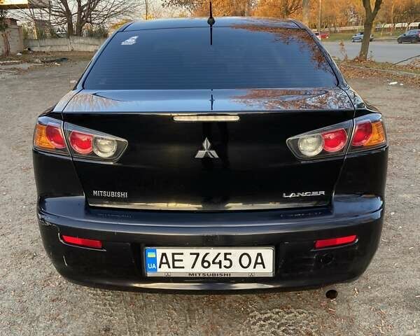 Черный Мицубиси Лансер, объемом двигателя 2 л и пробегом 175 тыс. км за 9200 $, фото 12 на Automoto.ua