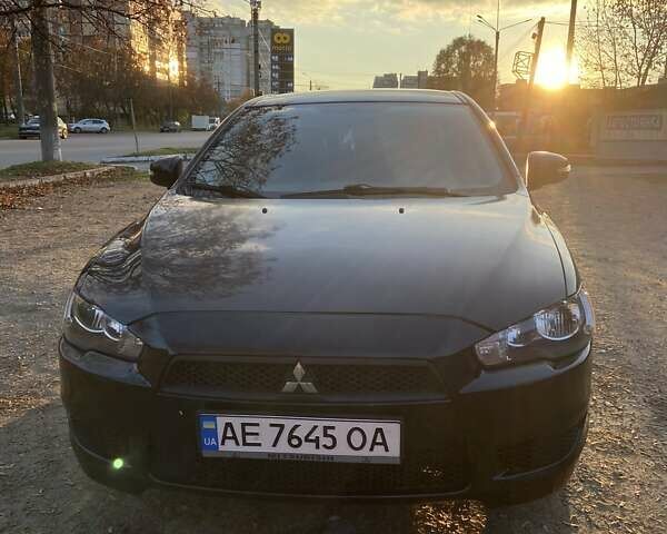 Черный Мицубиси Лансер, объемом двигателя 2 л и пробегом 175 тыс. км за 9200 $, фото 8 на Automoto.ua
