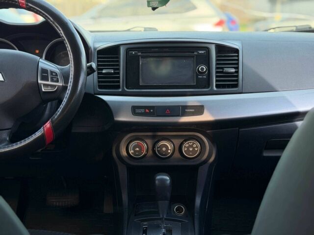 Черный Мицубиси Лансер, объемом двигателя 2.4 л и пробегом 160 тыс. км за 6700 $, фото 16 на Automoto.ua