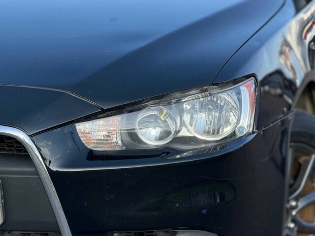 Черный Мицубиси Лансер, объемом двигателя 2.4 л и пробегом 160 тыс. км за 6700 $, фото 3 на Automoto.ua