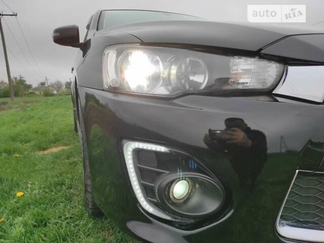 Чорний Міцубісі Lancer, об'ємом двигуна 2 л та пробігом 136 тис. км за 8700 $, фото 10 на Automoto.ua