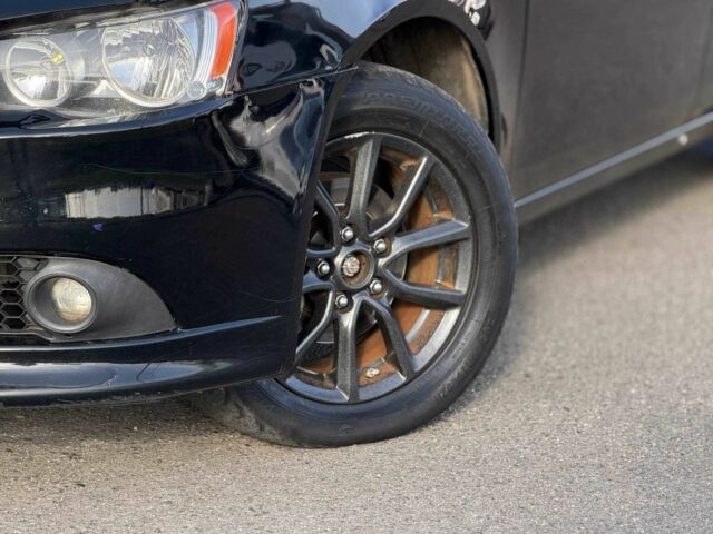 Черный Мицубиси Лансер, объемом двигателя 2.4 л и пробегом 160 тыс. км за 6700 $, фото 4 на Automoto.ua