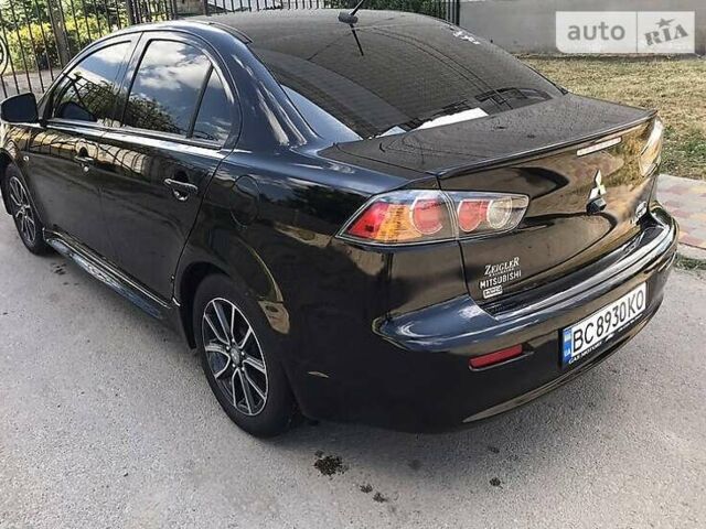 Чорний Міцубісі Lancer, об'ємом двигуна 2.36 л та пробігом 169 тис. км за 9000 $, фото 2 на Automoto.ua